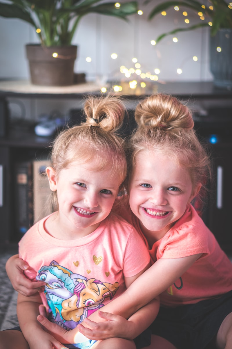 Happy children giggling together while they play