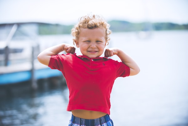 A child beaming with excitement at play